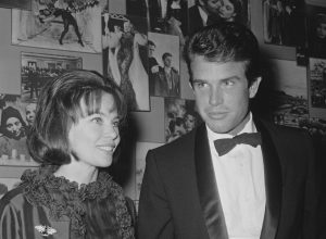 Leslie Caron and Warren Beatty at the premiere of "The Americanization of Emily" in 1964