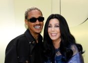 Alexander Edwards and Cher at the Versace FW23 Show in March 2023