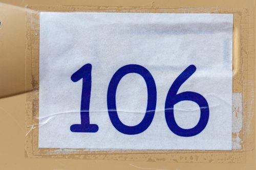 number 106 printed in comic sans style