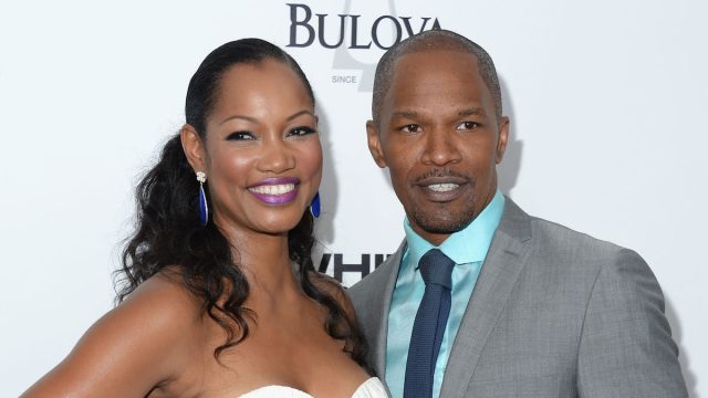 Garcelle Beauvais and Jamie Foxx at the premiere of "White House Down" in 2013