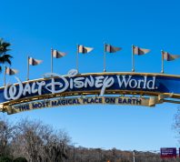 A Walt Disney World arch gate on the road in Orlando, Florida, USA.