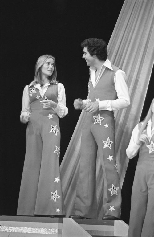 Mauren McCormick and Barry Williams filming "The Brady Bunch Hour" in 1977