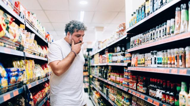 Man shopping at market grocery store