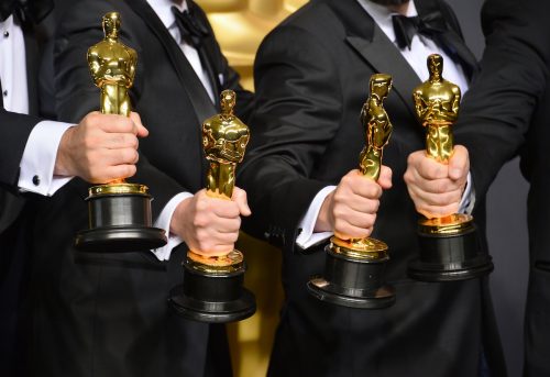 People holding Oscar awards in 2017