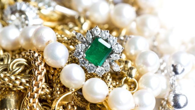 pile of jewelry and emerald