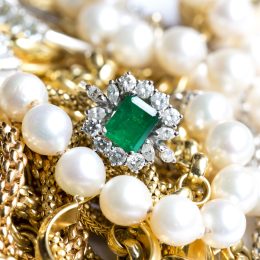 pile of jewelry and emerald