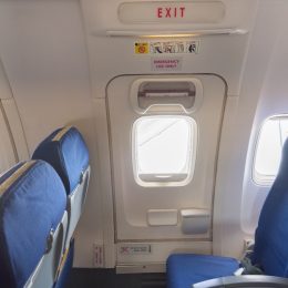 United Airlines passenger tries to jump out of emergency exit