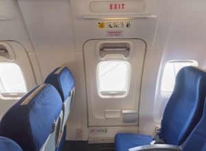 United Airlines passenger tries to jump out of emergency exit