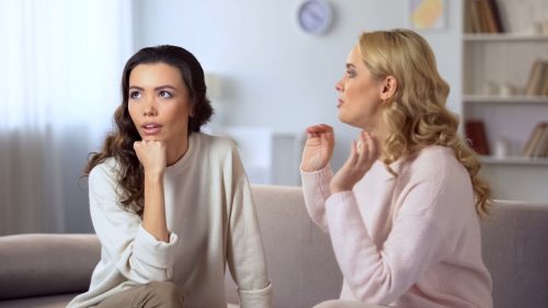woman getting annoying with friend
