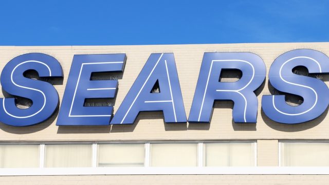 sign on the front of sears store