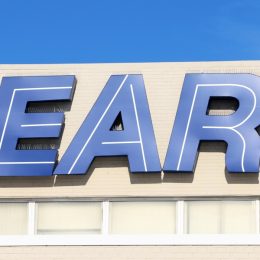 sign on the front of sears store