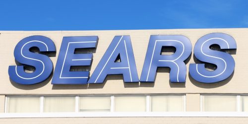 sign on the front of sears store