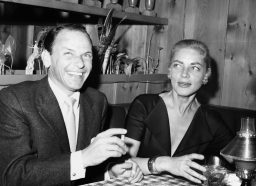 Frank Sinatra and Lauren Bacall at a party in 1957