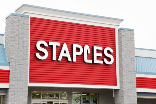 A Staples sign on its storefront