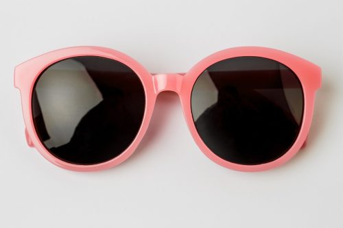 pink sunglasses on a white background
