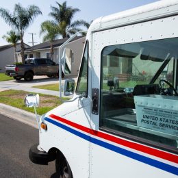 Fullerton, California / USA - September 3, 2020: A USPS (United States Parcel Service) mail truck makes a delivery.