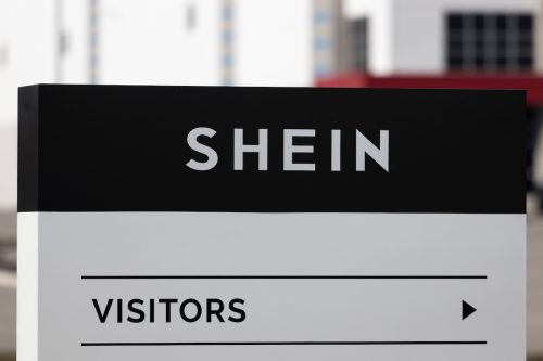 Visitor sign at SHEIN distribution center