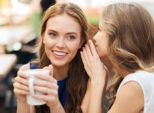 Two Girls Sharing Secrets