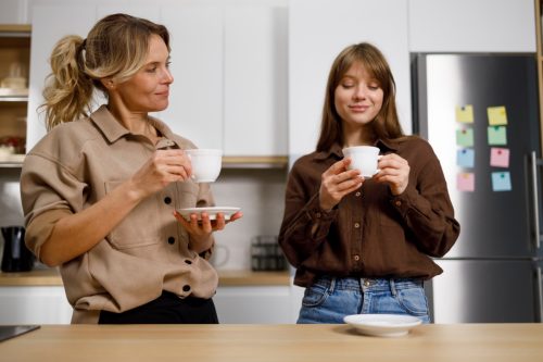 Two Women Talking Over Coffee