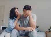 Woman Comforting Unhappy Man