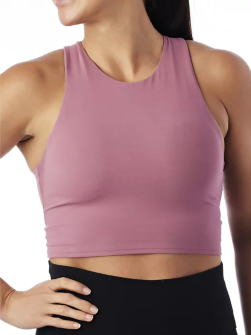 Cropped shot of a model wearing a mauve sports bra from Walmart