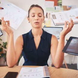 Woman Meditating During Work