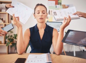 Woman Meditating During Work