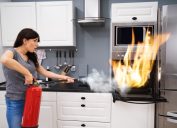 Woman Putting Out Oven Fire