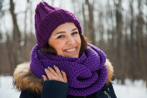 Woman Wearing Purple Hat and Scarf