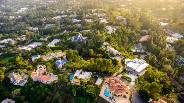 Beverly Hills landscape and mansions aerial view late afternoon