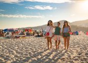 Summer tourism at Praia da California in Sesimbra, Portugal