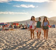 Summer tourism at Praia da California in Sesimbra, Portugal