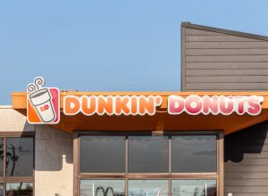 The exterior sign of a Dunkin' Donuts location