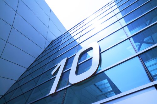 Close up of a glass building with the number 10 on it