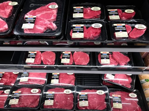 Fresh red meat on the shelves of a retail store