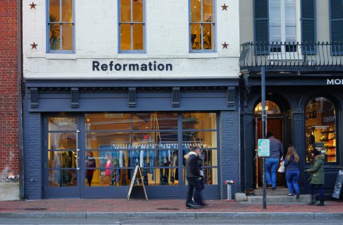 Reformation storefront on historic city street