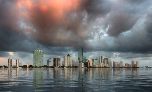 Miami cityscape skyline at sunrise on cloudy morning