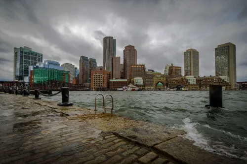 A winter Nor'easter storm surge floods Boston Harbor.