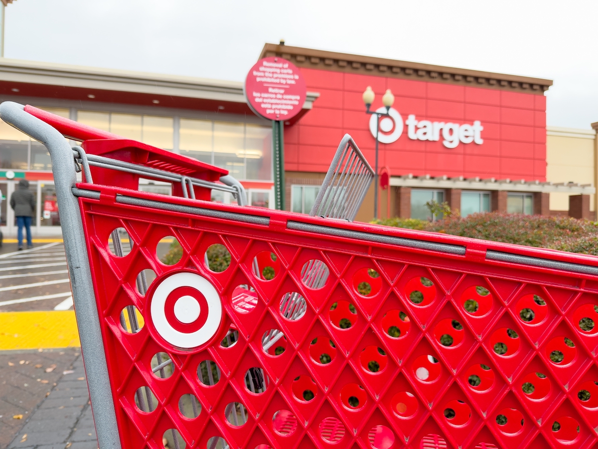 Target shopping cart with a store in the background