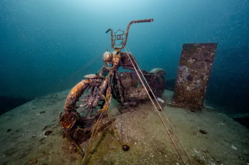 submerged rusty motorcycle