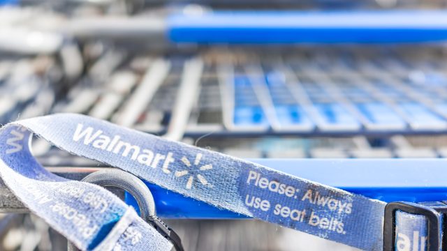 A close up of a strap on a Walmart shopping cart