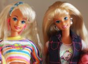 Two Barbie dolls side by side