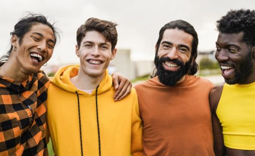 Four Diverse Men Smiling and Hanging Out