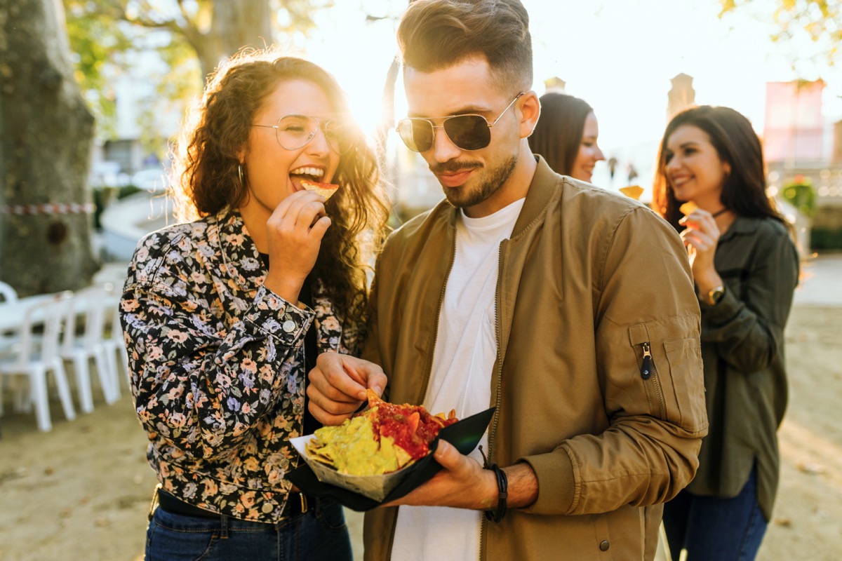 Friends Enjoying Street Food