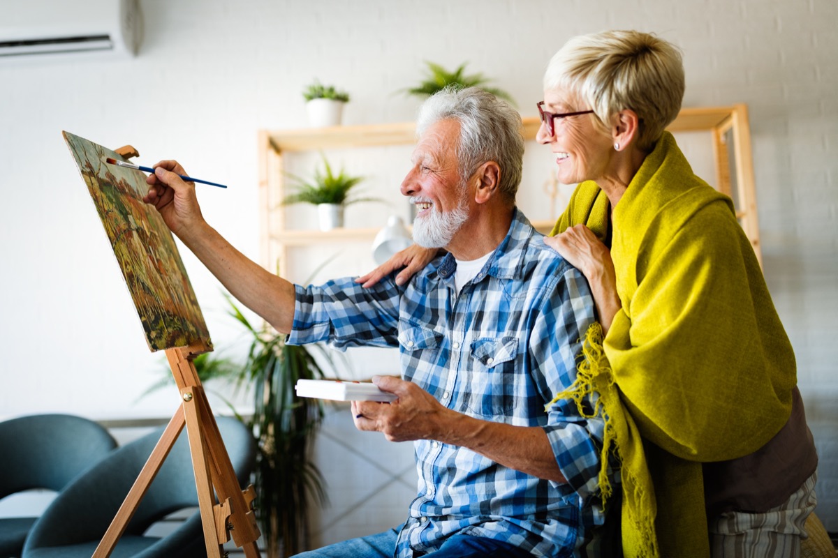 Older Man and Woman Painting