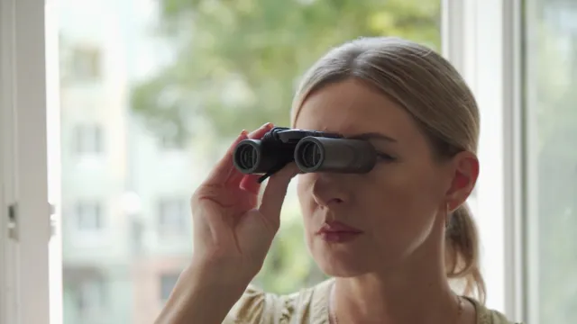 Woman Using Binoculars