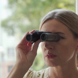 Woman Using Binoculars