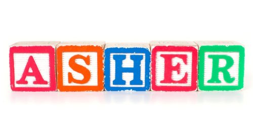 Toy blocks spelling out the name "ASHER"