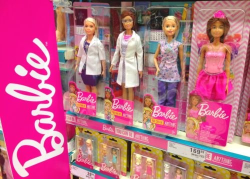 career barbies on a shelf at the toy store