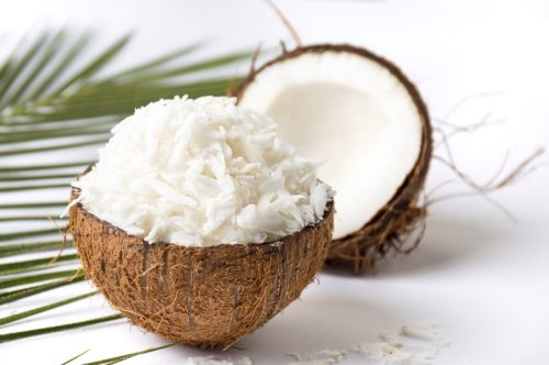 grated coconut fruit in a natural shell